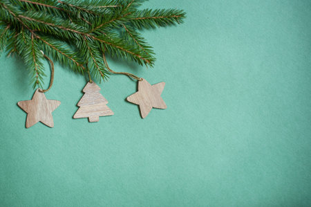 branches of a Christmas tree and decoration on the Christmas tree green background.