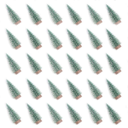 green pine trees on a white background. patternの写真素材
