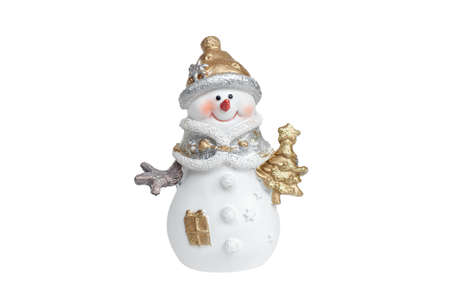Snowman holding a Christmas tree on a white background. Isolateの写真素材