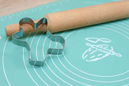 Man-shaped cookie cutter on a silicone matの写真素材