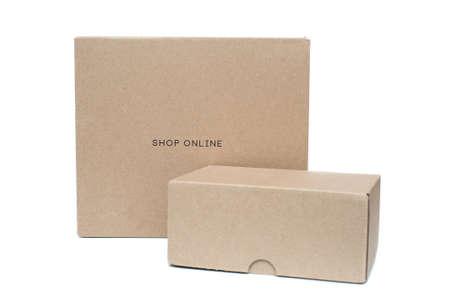 Cardboard boxes inscription online shop on white backgroundの写真素材