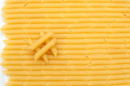 Pasta penne background close-up. View from aboveの写真素材