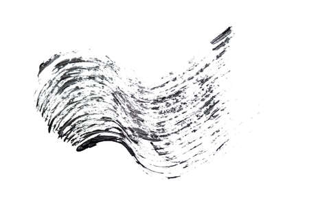 Black mascara brush stroke isolated on white backgroundの写真素材