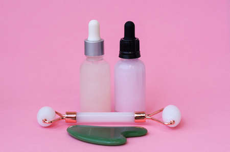 Home spa and personal care products on pink backgroundの写真素材