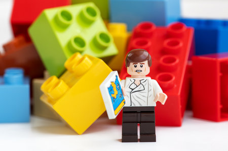 Lego mini characters worker and the bricks set. Lego mini figure are the successful line in Lego productsのeditorial素材