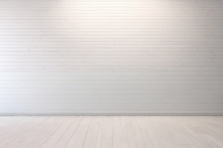 White brick wall and wooden floorbe used as background.の素材