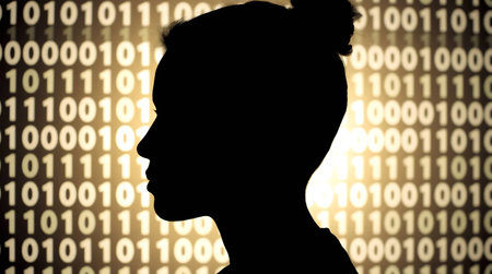 Silhouette of a girl with binary code in the background.の素材