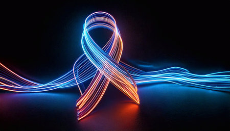 Neon ribbon glows in vibrant colors against a dark backdrop, flowing gently.の素材