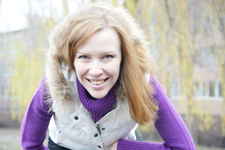 Mature blonde fit woman walking outdoors