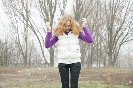 Mature blonde fit woman walking outdoors