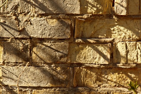 old stone wall close up. background texture.の写真素材