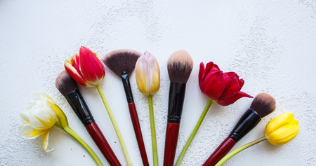 Brush for applying makeup on face close up. wide soft bristle brush top view on white background.の写真素材