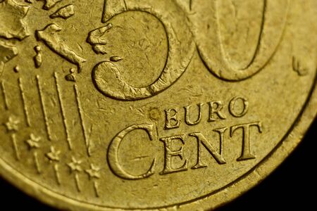 Coin Fifty Eurocent Macro Isolated On Black Background. Detail of metallic money close up. EU money.の写真素材