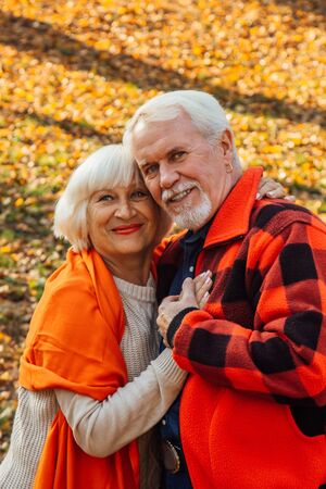 An elderly couple is dancing. Smiling old woman. Movement is life. I feel young againの写真素材