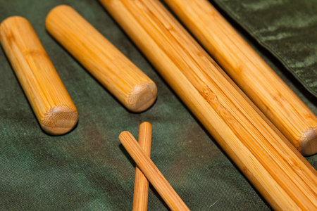 A set of professional bamboo sticks for Thai massage. Preparation for the procedure of healing the...