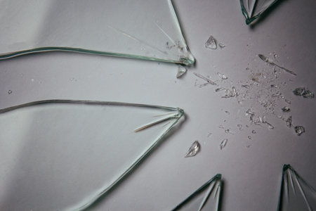 Broken glass pile pieces of texture and background isolated on white, cracked window effect....