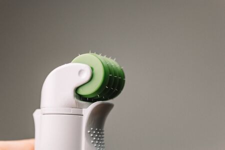 Dermaroller for mesotherapy. The fixture makes anti aging dermis roller. Facial treatment needlesの写真素材