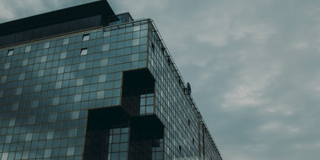 Geometric background with many window rows. Modern building structure. Many glasses on a huge wall....