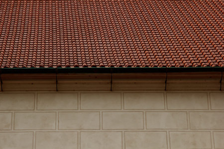 Prague. 05.10.2019: Low light detail of patina red roof top. Prague Lesser Town typical roofing...