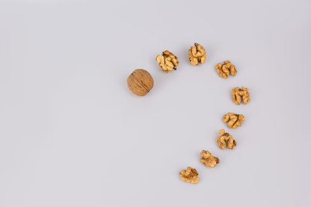 Half a walnut isolate. Peeled walnut on white. Walnut top view. Set with clipping path. Valentine's...