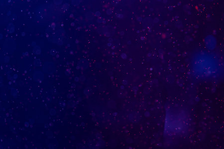 Sea and ocean jellyfish swim in the water close-up. Illumination and bioluminescence in different...