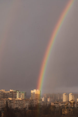 Double rainbow against the sunset sky. Leprechaun at the end of the rainbow. Rainbow as a concept of fantastic money. Pot of gold. St.Patrick's Dayの写真素材