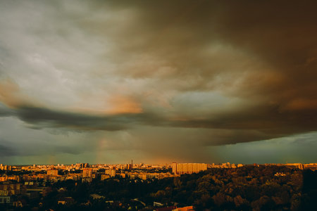 Evening city in storme weather. Thunderous clouds.の写真素材