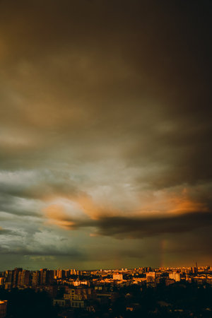 Evening city in storme weather. Thunderous clouds.の写真素材