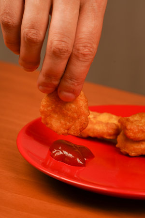 Chicken nuggets with ketchup. Fast food. Junk food. Calories. American food.の写真素材