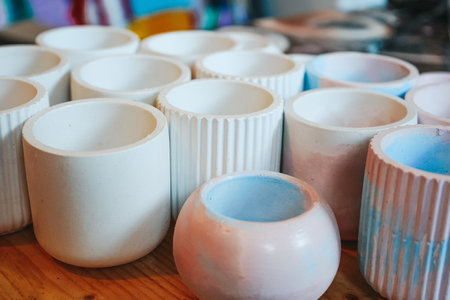 Empty jars for candles. Scented candles for home with various compositions. Perfumed smells in bottles. Market of small business. Fashionable accessories for home decoration.の写真素材