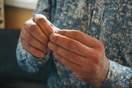 Person working on something with their hands.の写真素材