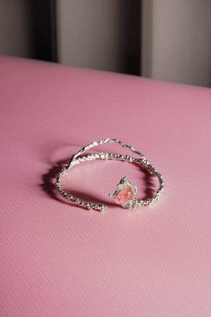 Side view of gem ring detail. A ring in a modern avant-garde style. Jewelry in a bold and daring...