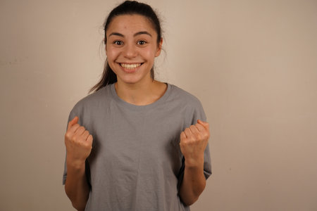 The gesture exudes strength and confidence, showing the person s resolve. It s a powerful symbol of courage and preparation. Clenched fists convey determination and readiness for self-defense.の写真素材