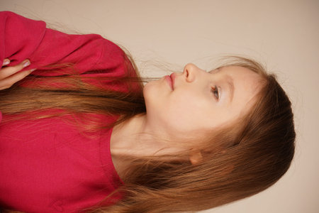 Her expressive features and radiant complexion make her truly captivating. The image conveys purity...