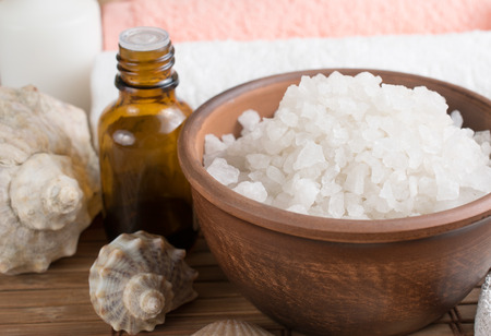 Spa salon with sea salt  on the bamboo boardの写真素材