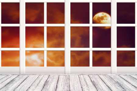 Room interior with window and night sky with mysterious clouds and red moon eclipse outside. Moon is...