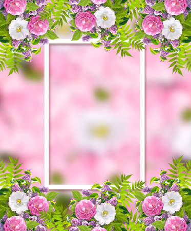 Beautiful floral garland consists of lilacs flowers, dog rose (briar), green leaves and frame on blurred pink background. Copy space for photo or text.の写真素材