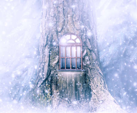 Christmas festive fabulous card with fairytale house in pine tree, wooden window, winter snow background, snowfall and snowflakes. Fantasy new year fairy tale landscape, snowy spruce fir tree forest.の写真素材