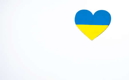 Love Ukraine concept. Hands in the shape of a heart are painted in the color of the flag of Ukraine - yellow and blue. selective focus. Independence Day of Ukraine, flagの写真素材