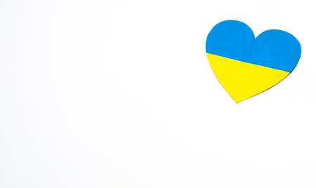 Love Ukraine concept. Hands in the shape of a heart are painted in the color of the flag of Ukraine - yellow and blue. selective focus. Independence Day of Ukraine, flagの写真素材