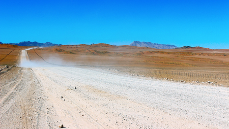 Ground road through the desertの写真素材