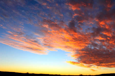 Dramatic sunset sky and beautiful cloudsの写真素材