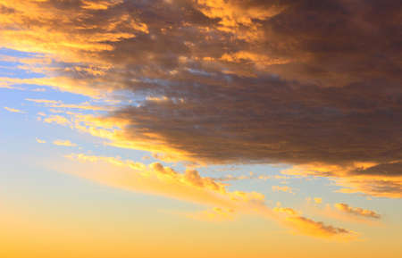 Dramatic sunset sky and beautiful cloudsの写真素材