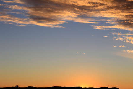 Dramatic sunset sky and beautiful cloudsの写真素材