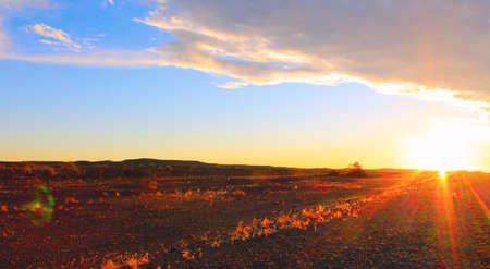 Sunset sky and road in the desertの写真素材