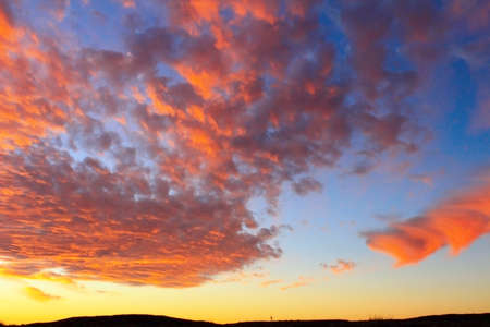 Dramatic sunset sky and beautiful cloudsの写真素材