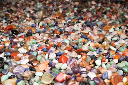 Natural background - pile of semi precious jewelery stones closeup. best for craftmanship, interior designの写真素材
