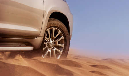 Close up of a golden car stuck in the sand in the Namib desert. Walvis Bay. Namibia. Africa 07.02.2020のeditorial素材