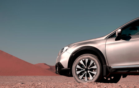 Close-up of a car  stands in the sand of the Namib Desert on a sunny day. 23.08.2021. Sossusvlei,...