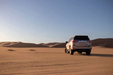 Toyota  Fortuner standing in the middle of the Namib desert on a sunny day. Namibia, Africaのeditorial素材